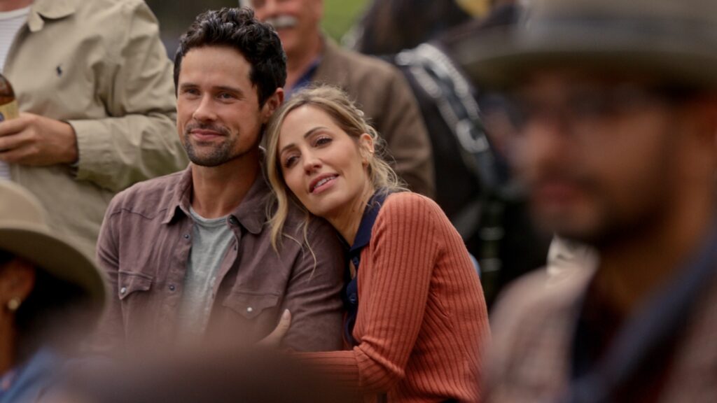 Virgin River S7. (L to R) Benjamin Hollingsworth as Dan Brady and Zibby Allen as Brie Sheridan in Episode #710 of Virgin River S7. Cr. Courtesy of Netflix © 2025 Virgin River S7. (L to R) Benjamin Hollingsworth as Dan Brady and Zibby Allen as Brie Sheridan in Episode #710 of Virgin River S7. Cr. Courtesy of Netflix © 2025