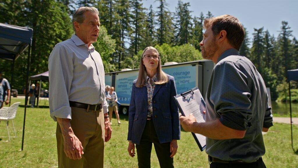 Virgin River S7. (L to R) Tim Matheson as Dr. Vernon Mullins, Annette O'Toole as Hope McCrea and Kaj-Erik Eriksen as Dr. Hayes in Episode #709 of Virgin River S7. Cr. Courtesy of Netflix © 2025 Virgin River S7. (L to R) Tim Matheson as Dr. Vernon Mullins, Annette O'Toole as Hope McCrea and Kaj-Erik Eriksen as Dr. Hayes in Episode #709 of Virgin River S7. Cr. Courtesy of Netflix © 2025