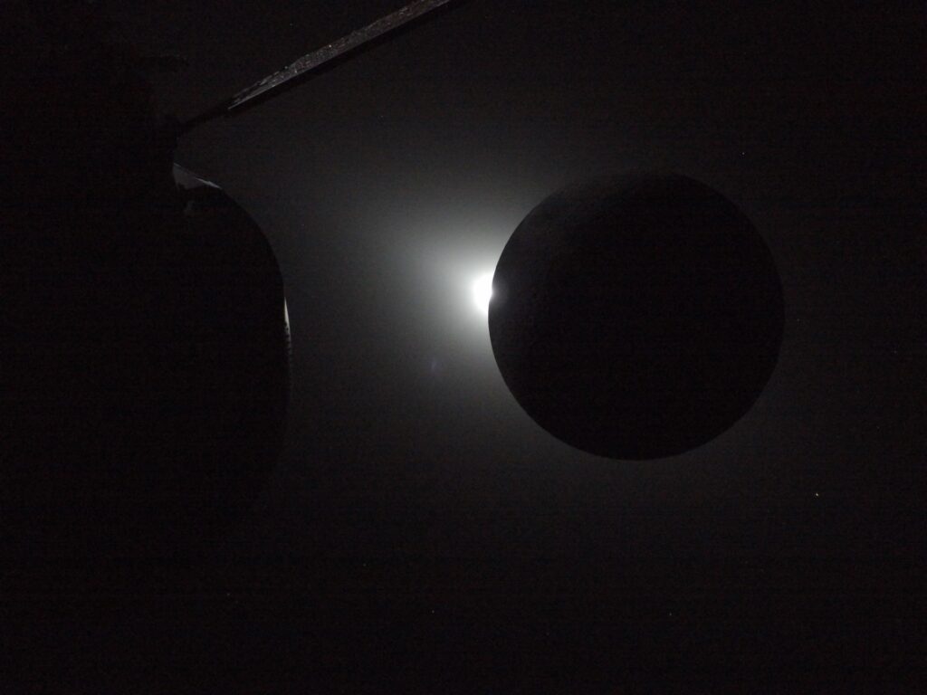art002e009575 (April 6, 2026) - The Sun is rising at the left edge of the Moon, ending a nearly one-hour total solar eclipse on April 6, 2026. While the Sun hid behind the Moon, the crew aboard the Orion spacecraft, pictured in the forefront, saw a Moon shrouded in night. This offered a perfect opportunity to look for rarely seen phenomena. And the moment delivered. Calling down to Earth at 9 p.m. ET the crew reported seeing six impact flashes, which are light flashes that are created when meteoroids, traveling many thousands of miles per hour, smash into the Moon’s surface. Credit: NASA art002e009575 (April 6, 2026) - The Sun is rising at the left edge of the Moon, ending a nearly one-hour total solar eclipse on April 6, 2026. While the Sun hid behind the Moon, the crew aboard the Orion spacecraft, pictured in the forefront, saw a Moon shrouded in night. This offered a perfect opportunity to look for rarely seen phenomena. And the moment delivered. Calling down to Earth at 9 p.m. ET the crew reported seeing six impact flashes, which are light flashes that are created when meteoroids, traveling many thousands of miles per hour, smash into the Moon’s surface. Credit: NASA