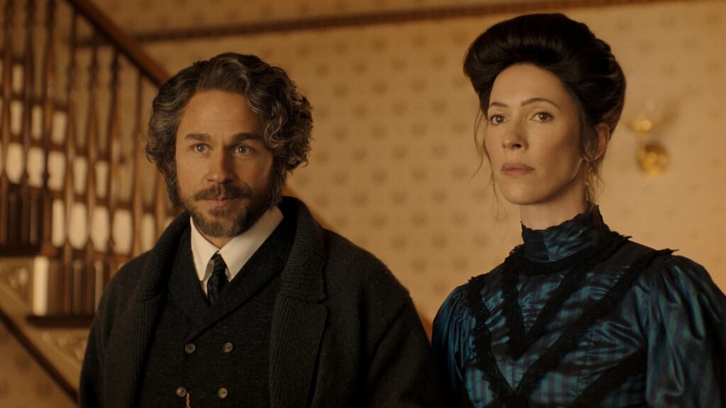 Monster: The Lizzie Borden Story. (L to R) Charlie Hunnam as Andrew Borden, Rebecca Hall as Abby Borden in episode 401 of Monster: The Lizzie Borden Story. Cr. Courtesy of Netflix © 2026 Monster: The Lizzie Borden Story. (L to R) Charlie Hunnam as Andrew Borden, Rebecca Hall as Abby Borden in episode 401 of Monster: The Lizzie Borden Story. Cr. Courtesy of Netflix © 2026