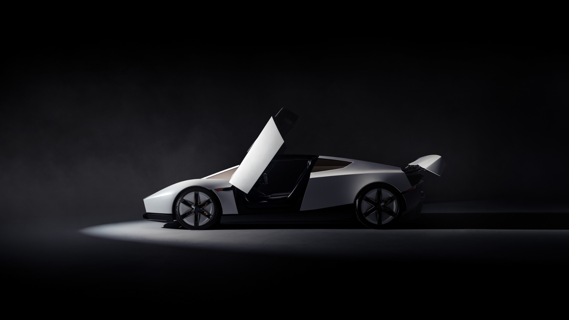 Le Tesla Roadster de profil (ouvert)